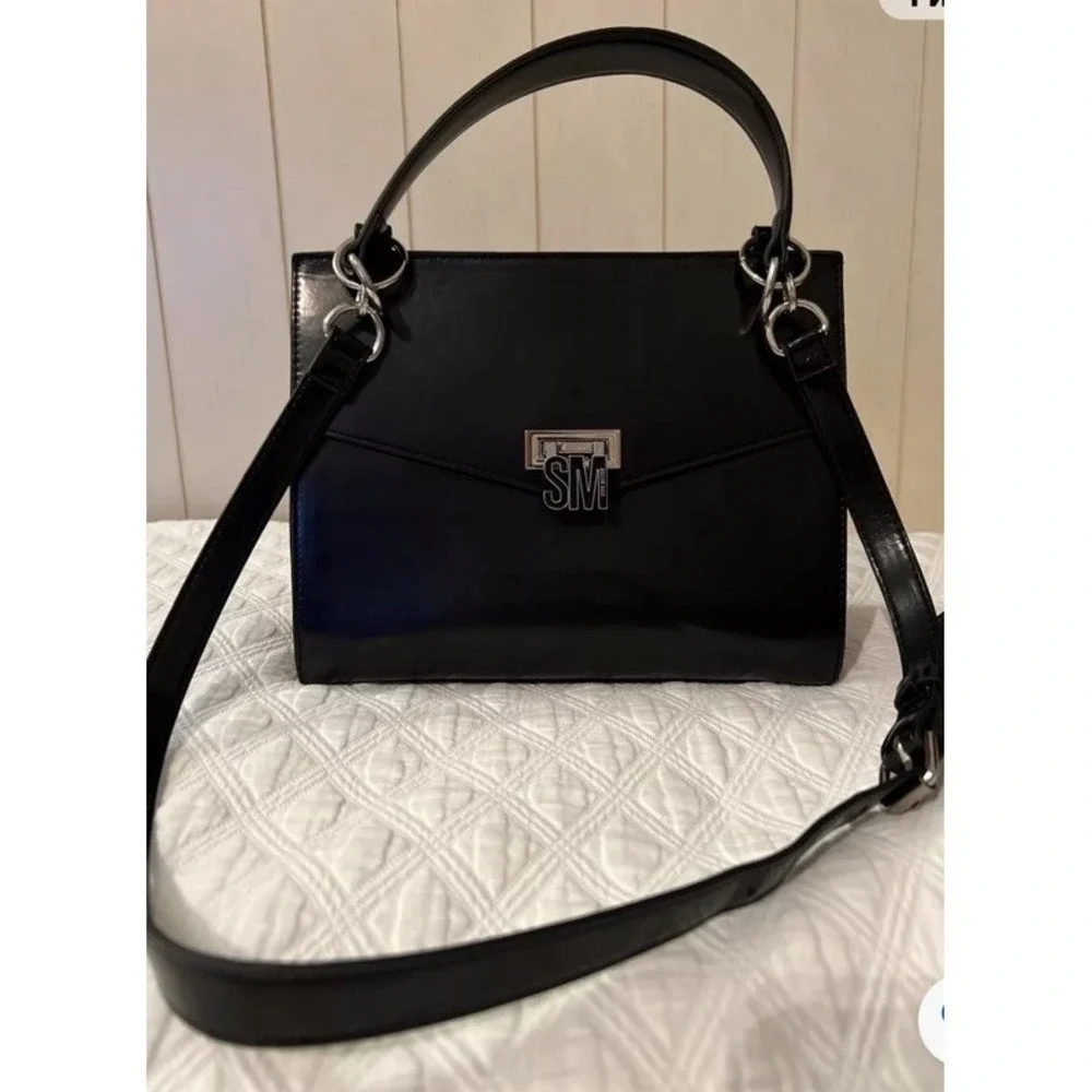 Steve Madden bag, sizes 10 × 8 with adjustable‎ strap,,black